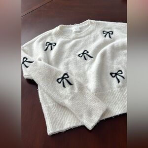Abercrombie Kids White Sweater with Black Bow Details. Butterfly So